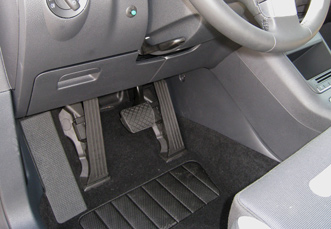Electronic left foot gas pedal